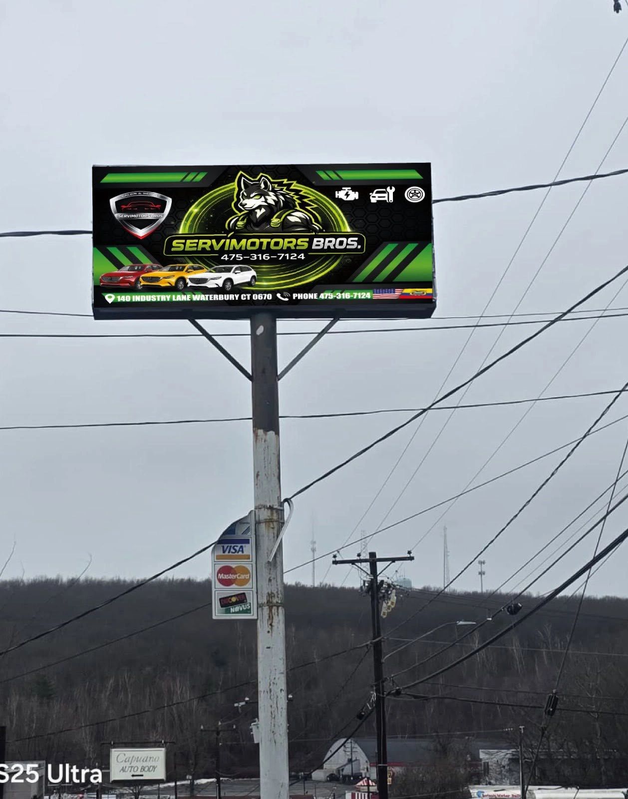 Auto business signage: Pole-mounted sign